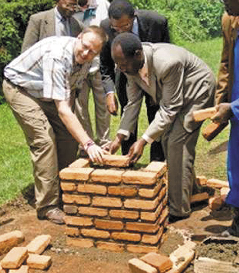 Laying the corner stone for Rwankeri.